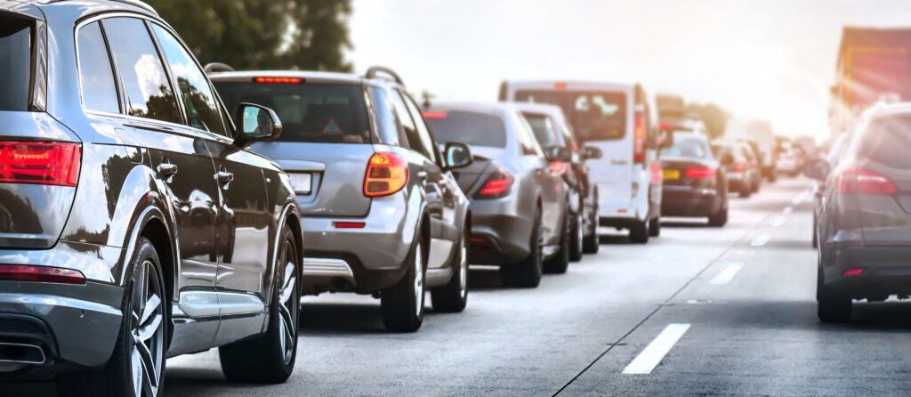 Car rush hours city street. Cars on highway in traffic jam, best cities for commuters average commute time